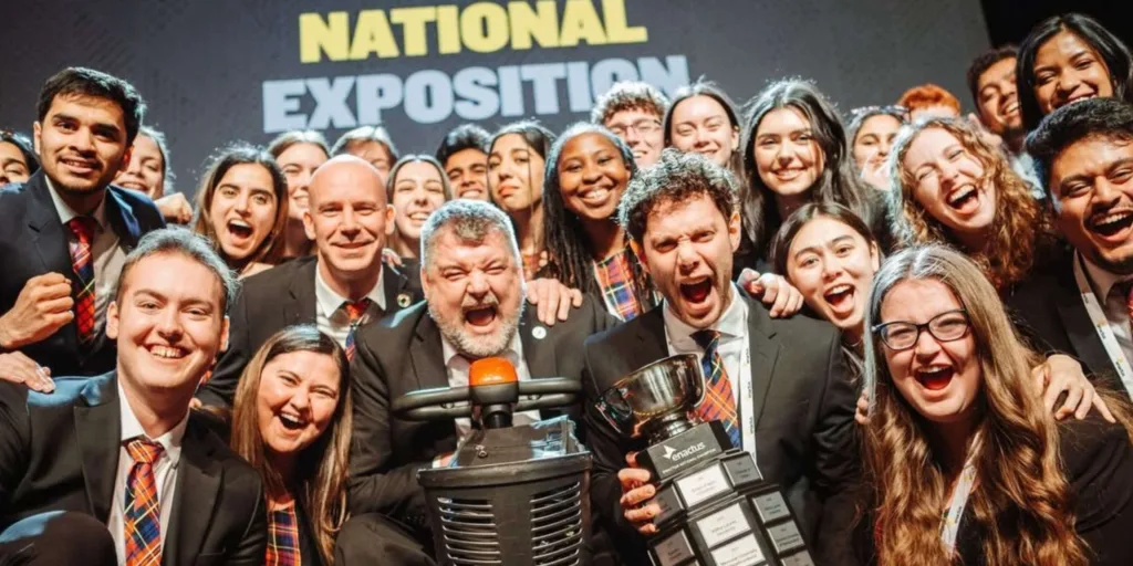 Group celebrating at National Exposition event.