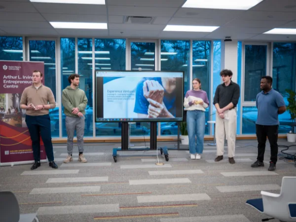 Group presenting at entrepreneurial center event.
