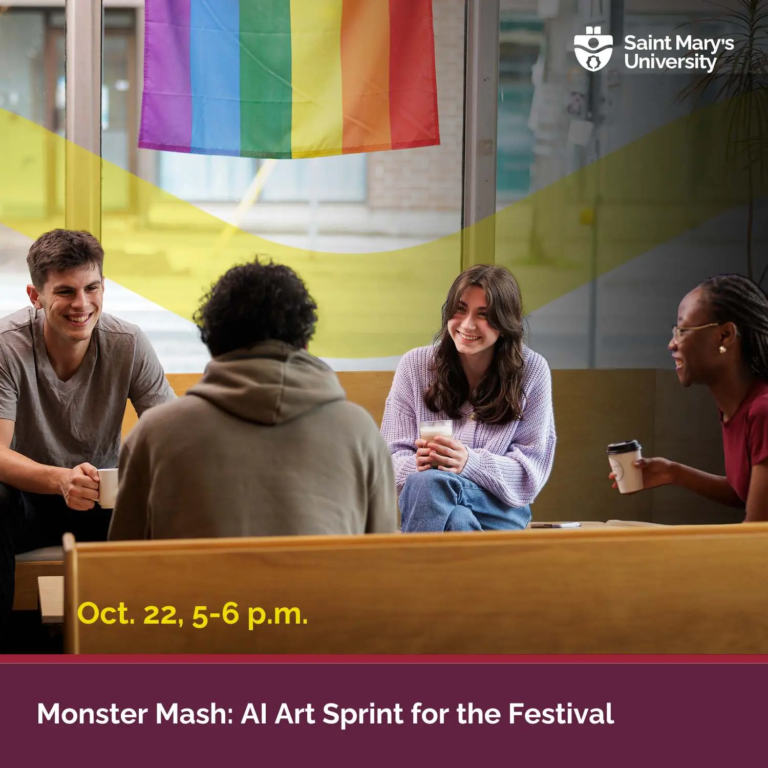 Students chatting under rainbow flag at Saint Mary's event.