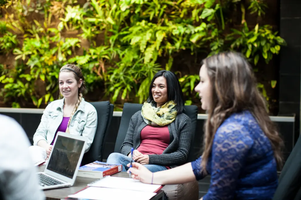 Group meeting in green office space.