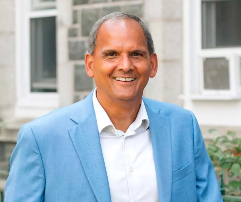 Smiling man in a blue suit