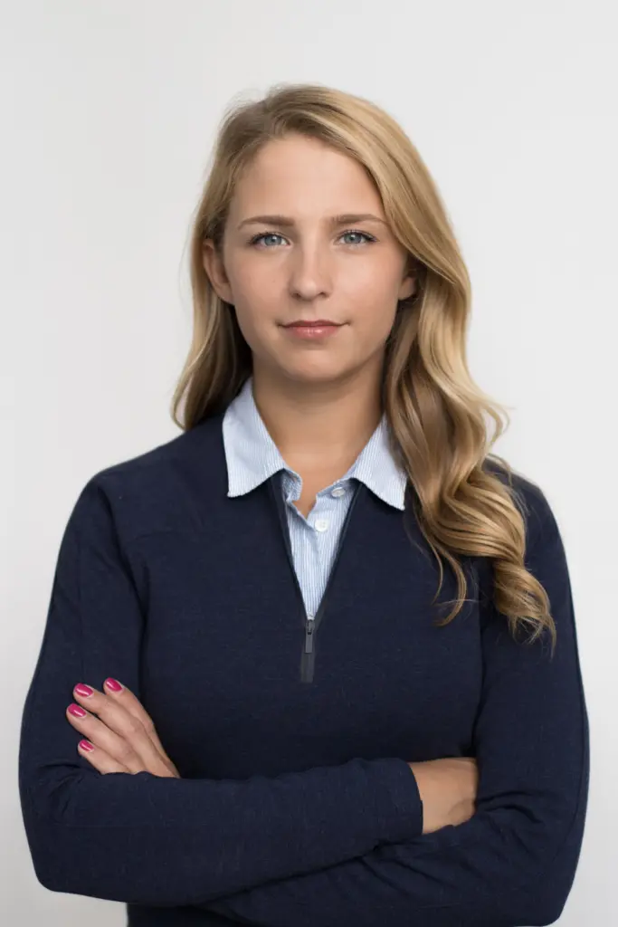 Confident woman with crossed arms