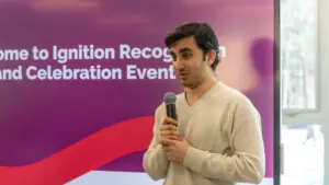 Man speaking at corporate recognition event