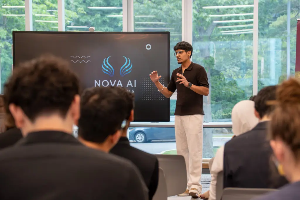 Presenter speaking at Nova AI presentation
