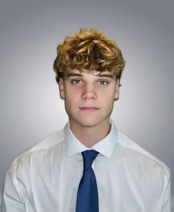 Young man in white shirt and blue tie