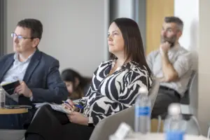 Professionals listening attentively during a business meeting