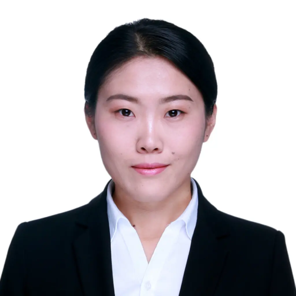 Professional headshot of woman in black blazer