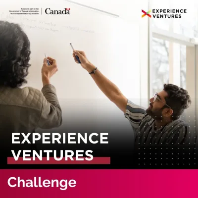 Two people collaborating at a whiteboard, Experience Ventures.